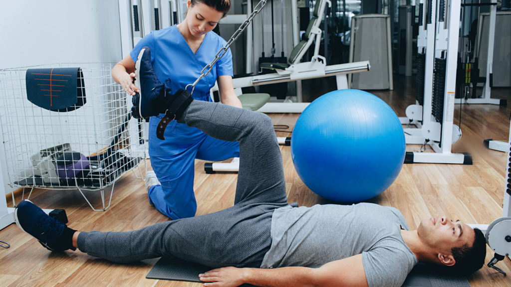 A physiotherapist at Equilibrium in Victoria helps treat her client's sciatica.